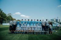 Fußballmannschaft des TSV 1860 aufgestellt mit sichtbaren Rückennummern