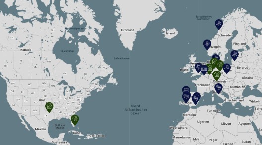 Ausschnitt einer Weltkarte mit Pins für die Investmentobjekte
