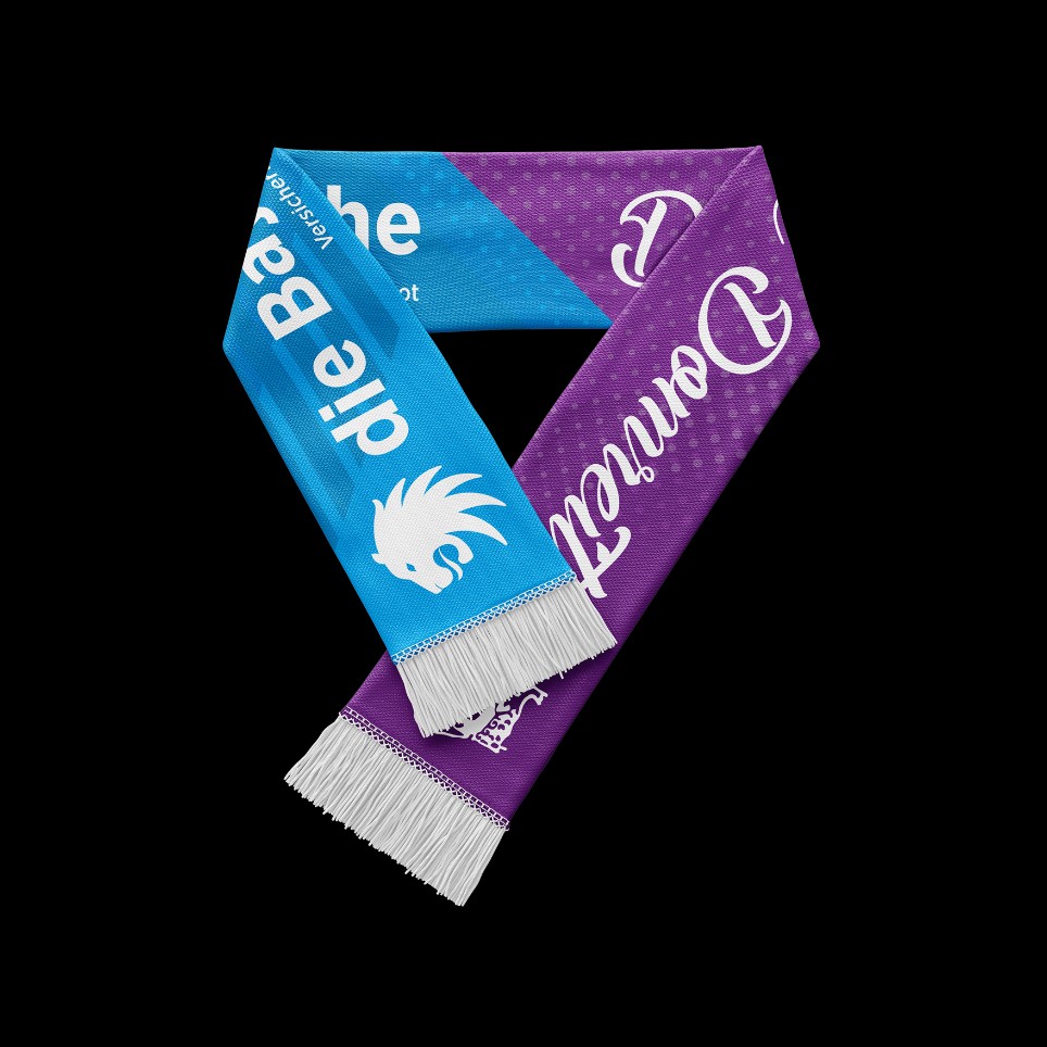 Abbildung des exklusiven Fanschals für den Domreiter-Schutz in blau und violett Abbildung des exklusiven Fanschals für den Domreiter-Schutz in blau und violett